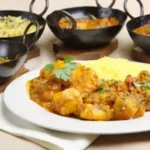 a variety of curry dishes sharing a base curry gravy