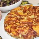 spanish tortilla with sweet potato, feta and broad beans
