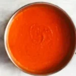 tomato sauce in a stainless steel pan