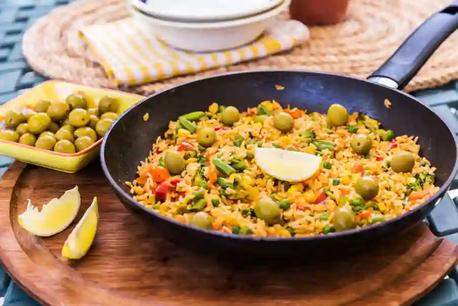 Spanish vegan paella recipe using a wide open pan